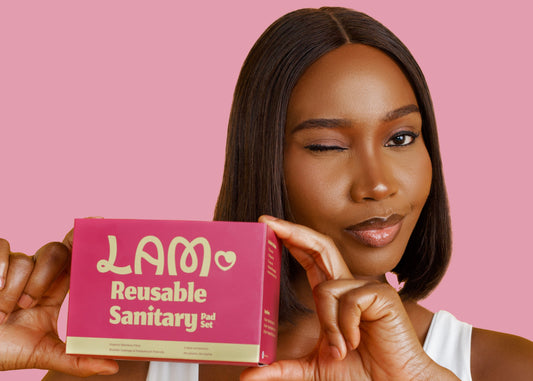 woman holding reusable pads set